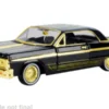 Motormax Chevrolet Impala, schwarz/gold, 1964, 1:24, Sale