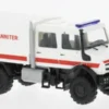 Busch Mercedes Unimog U5023, 2013, Johanniter, 1:87, Discount