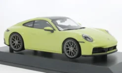Minichamps Porsche 911 (992.2) Carrera Coupe, gelb, 2024, 1:18, New